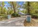 Long driveway leading to a charming two-story home at 7629 Sw 188 Ave, Dunnellon, FL 34432