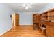 Bright home office features wood built-ins and hardwood floors at 7629 Sw 188 Ave, Dunnellon, FL 34432