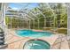 Inviting kidney-shaped pool with a spa at 7629 Sw 188 Ave, Dunnellon, FL 34432