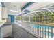 Relaxing pool and spa area with screened enclosure at 7629 Sw 188 Ave, Dunnellon, FL 34432