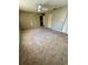 Spacious bedroom with carpeting, a ceiling fan, and closet at 9025 Sw 94Th Ln # C, Ocala, FL 34481