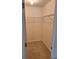 Walk-in closet featuring ample storage space with wire shelving and neutral carpeting at 9951 Sw 62Nd Ter, Ocala, FL 34476