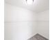 Walk-in closet with ample shelving, perfect for organized storage and maximizing space at 13026 Ne 6 Pl, Silver Springs, FL 34488