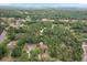 Overhead view of a tree covered property at 8975 Sw 202Nd Avenue Rd, Dunnellon, FL 34431