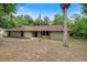 Charming single-story home with well-maintained lawn and landscaping at 8975 Sw 202Nd Avenue Rd, Dunnellon, FL 34431