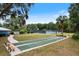 Neighborhood recreation area with shuffleboard courts, benches and trees at 8975 Sw 202Nd Avenue Rd, Dunnellon, FL 34431