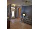 Inviting living room showcases neutral paint, modern floors, arched doorway and comfortable seating at 8678 Sw 83Rd Cir, Ocala, FL 34481