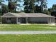 One-story home with stone and gray siding at 274 Se 34Th Pl, Ocala, FL 34471