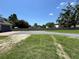 Empty lot with gravel driveway and surrounding trees at 274 Se 34Th Pl, Ocala, FL 34471