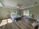 Spacious main bedroom with hardwood floors and large windows at 274 Se 34Th Pl, Ocala, FL 34471