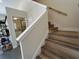 Wood-look staircase leading to the upper level of the home at 274 Se 34Th Pl, Ocala, FL 34471