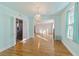 Light and airy dining room with hardwood floors and chandelier at 1226 Se 9Th Ave, Ocala, FL 34471