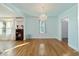 Dining room with hardwood floors, chandelier, and entryway view at 1226 Se 9Th Ave, Ocala, FL 34471