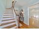 Hardwood floors and staircase in light blue entryway at 1226 Se 9Th Ave, Ocala, FL 34471