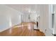 Bright and airy living room featuring hardwood floors, a fireplace, and light-filled windows at 1226 Se 9Th Ave, Ocala, FL 34471