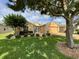 Charming single-story home featuring a lush green lawn and well-maintained landscaping at 16026 Sw 14Th Avenue Rd, Ocala, FL 34473