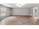 Large primary bedroom with a ceiling fan and plenty of natural light at 13359 Sw 80Th St, Dunnellon, FL 34432