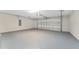 Clean and spacious two-car garage with sealed floor at 13359 Sw 80Th St, Dunnellon, FL 34432