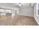 Bright, open-concept living space with modern finishes and wood flooring at 13359 Sw 80Th St, Dunnellon, FL 34432