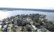 Wide view of the waterfront community and homes at 2 Se Chinica Dr, Summerfield, FL 34491