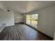 Dining room with hardwood floors and lake view at 2 Se Chinica Dr, Summerfield, FL 34491