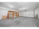 Spacious two-car garage with shelving and plenty of storage space at 8655 Sw 98Th Street Rd # G, Ocala, FL 34481