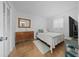 Bright bedroom with tiled floors and dresser at 567 Midway Trak # H102, Ocala, FL 34472