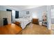 Cozy bedroom with a double bed and wood furniture at 567 Midway Trak # H102, Ocala, FL 34472
