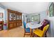 Dining area with tile floors and wood cabinet at 567 Midway Trak # H102, Ocala, FL 34472
