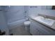 Clean bathroom with a bathtub, toilet and vanity at 11001 Se Sunset Harbor Rd # A08, Summerfield, FL 34491