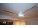 White ceiling fan with four blades at 11001 Se Sunset Harbor Rd # A08, Summerfield, FL 34491