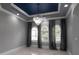 Formal dining room with gray walls and a crystal chandelier at 3440 Sw 66Th St, Ocala, FL 34476