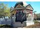 Historic Courthouse Square with informational signage, a gazebo, and patriotic decor at 10926 Sw 78Th Ct, Ocala, FL 34476