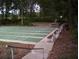 Outdoor shuffleboard courts with benches at 10926 Sw 78Th Ct, Ocala, FL 34476