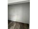 Large walk-in closet with wood-look flooring at 35 Locust Terrace Way, Ocala, FL 34472