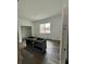 Modern kitchen with gray cabinets and wood-look flooring at 35 Locust Terrace Way, Ocala, FL 34472