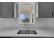 Kitchen stainless steel sink with window view at 35 Locust Terrace Way, Ocala, FL 34472