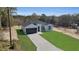 Newly constructed single-story home with a well-manicured lawn and an attached two-car garage at 5394 Nw 6Th Pl, Ocala, FL 34482