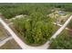Scenic aerial showing a home surrounded by trees offering privacy and a calm setting at 4444 Sw 118 Ter, Ocala, FL 34481