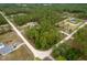 Secluded property surrounded by tall trees in a peaceful, forested neighborhood at 4444 Sw 118 Ter, Ocala, FL 34481