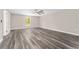 Comfortable bedroom with ceiling fan, large window, and closet at 4444 Sw 118 Ter, Ocala, FL 34481