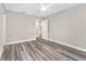 Well-lit bedroom with sleek floors, neutral walls, and ample doorway space at 4444 Sw 118 Ter, Ocala, FL 34481