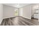 Bright bedroom with en suite bathroom, and new vinyl floors at 4444 Sw 118 Ter, Ocala, FL 34481
