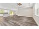 Large open living space with hardwood floors and a view of the backyard at 4444 Sw 118 Ter, Ocala, FL 34481