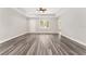 Beautiful open-concept living space with hardwood floors and natural light at 4444 Sw 118 Ter, Ocala, FL 34481