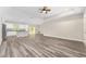 Bright living room with open access to kitchen and lots of natural light at 4444 Sw 118 Ter, Ocala, FL 34481