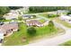 Aerial view of a single-Gathering home with a spacious yard in a residential neighborhood at 352 Marion Oaks Ln, Ocala, FL 34473