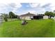 Large backyard with shed and screened patio at 352 Marion Oaks Ln, Ocala, FL 34473