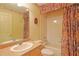 Clean bathroom with tub, shower, and updated vanity at 352 Marion Oaks Ln, Ocala, FL 34473