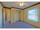 Bright bedroom with a large window and a spacious closet at 352 Marion Oaks Ln, Ocala, FL 34473